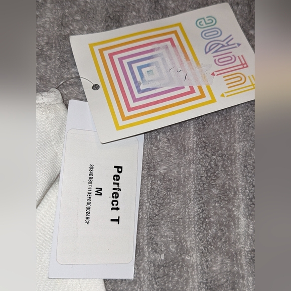 LULAROE MARIANNE WHITE FLORAL PERFECT SWING TEE SPRING COMFY SIZE MEDIUM NWT - Picture 7 of 8